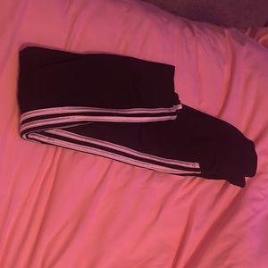 Black Adidas track pants
